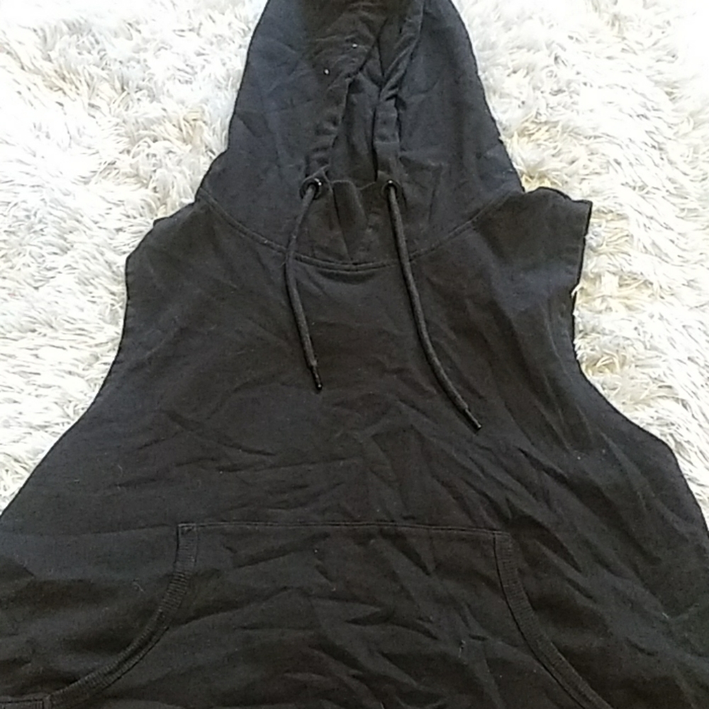 Sleeveless slightly cropped hoodie.